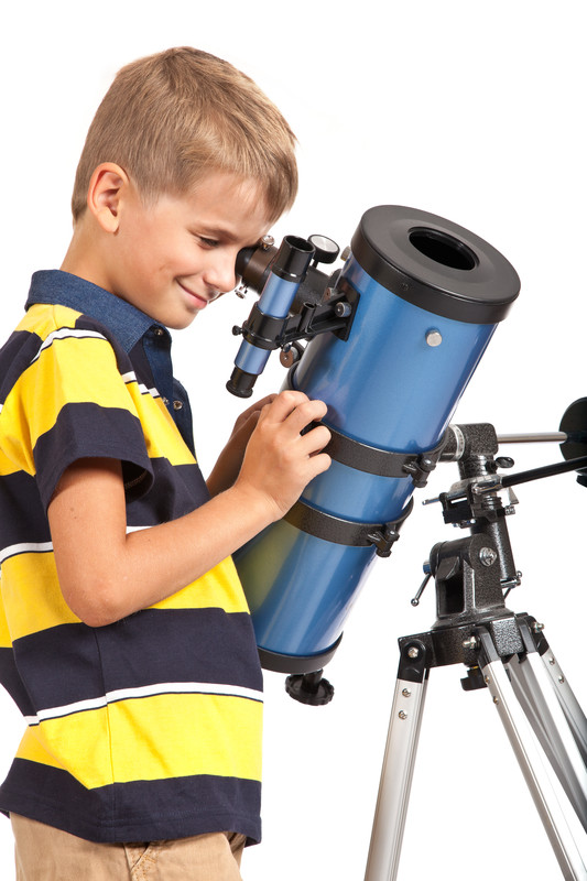 The boys are observing through a telescope.