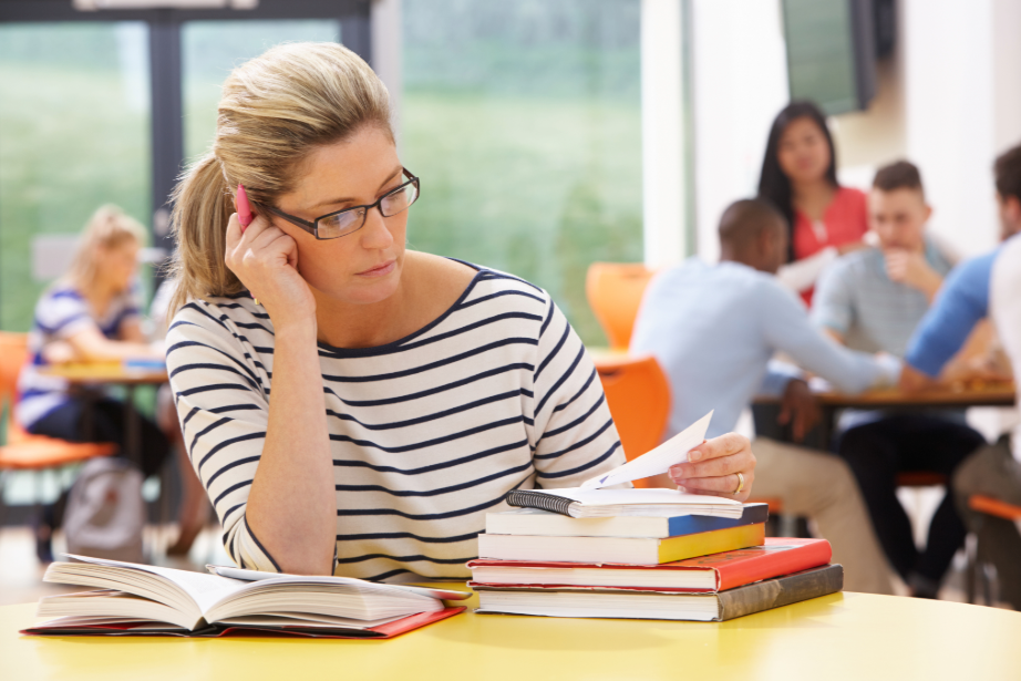 Teach your kid science and math in a homeschool without having to do it yourself. The girl is studying in a homeschool classroom.
